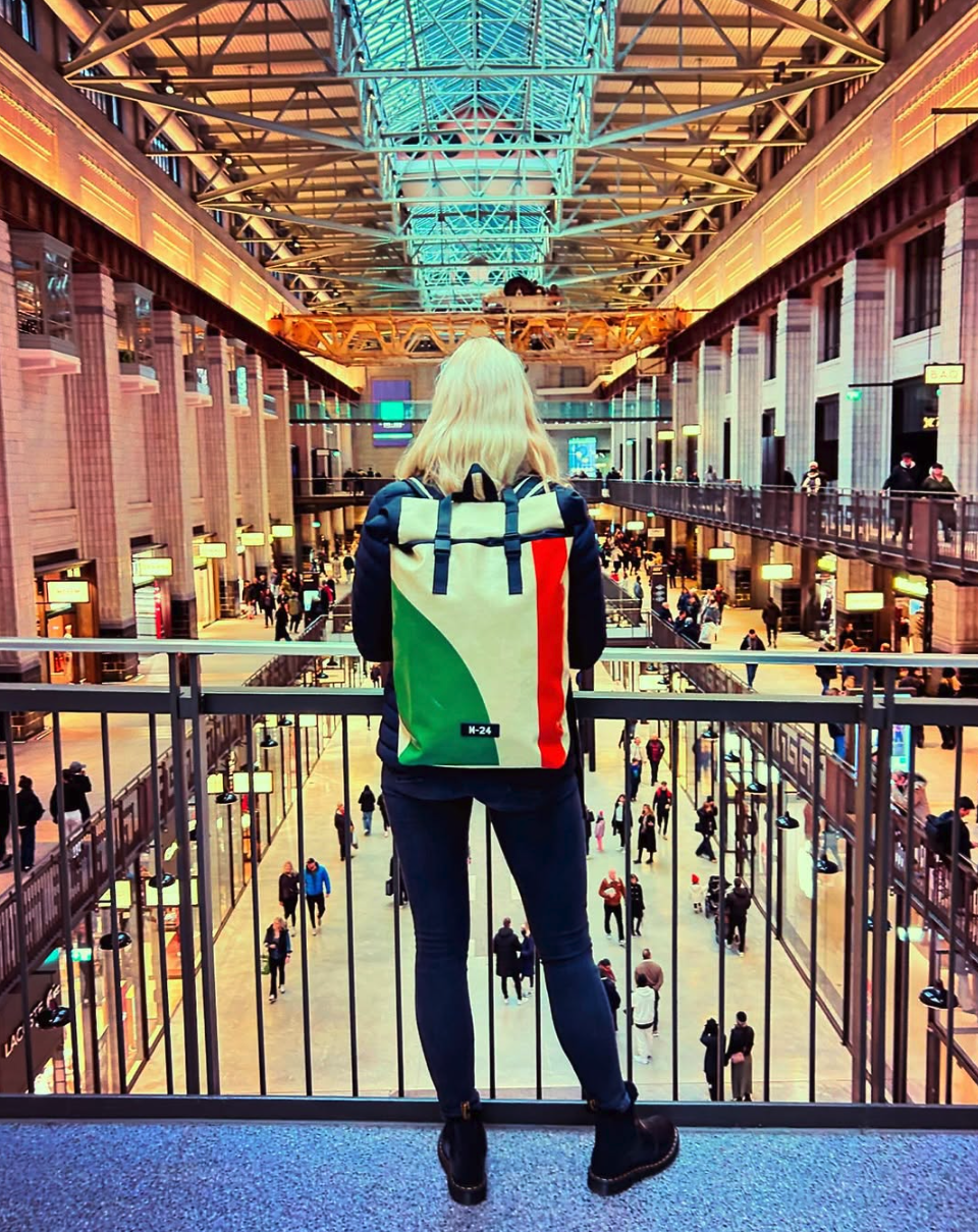 M-24 backpack in a grand station interior