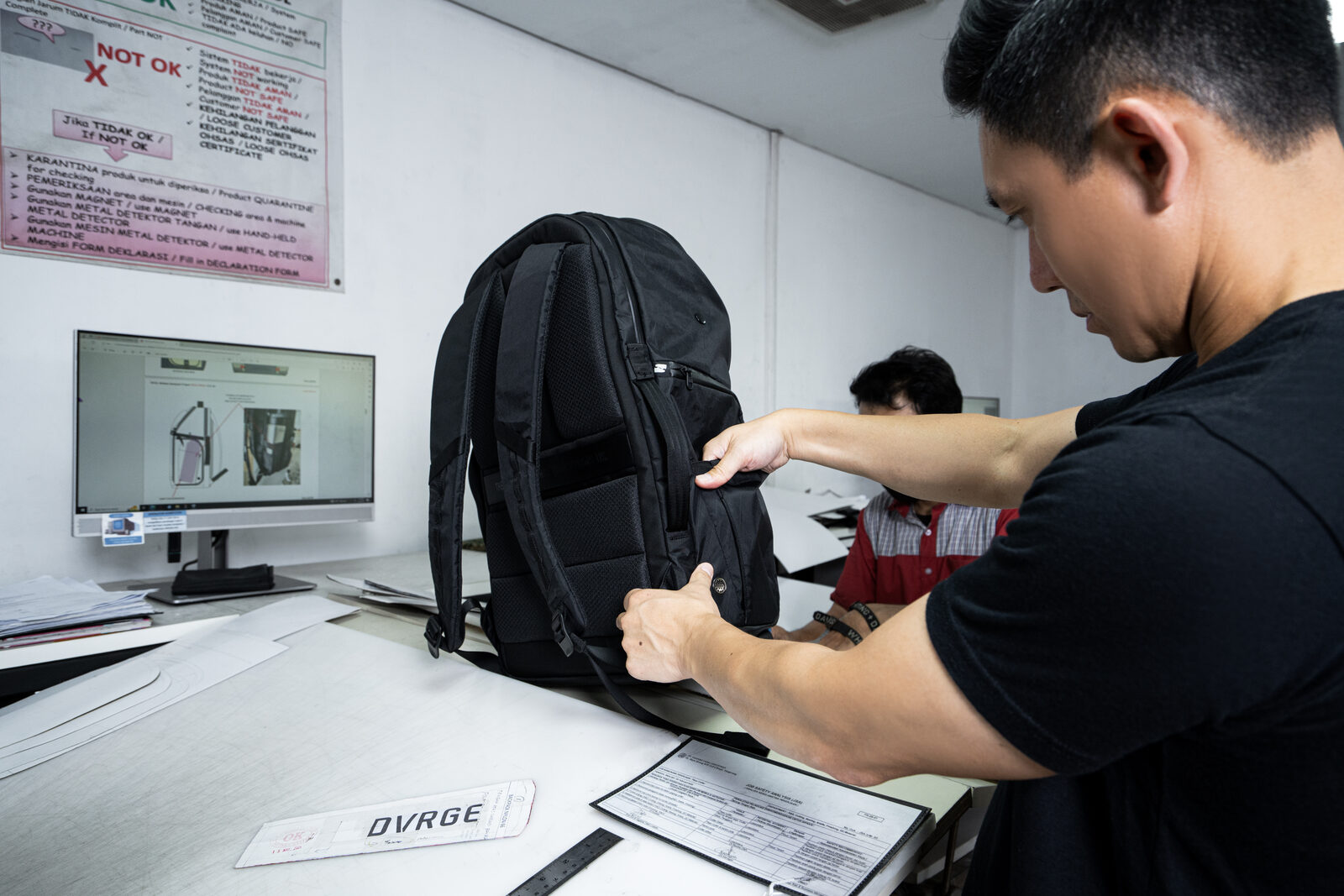 QC inspection of backpack against specification
