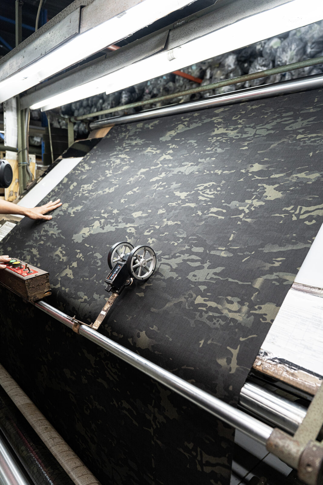 Camo X-Pac fabric on inspection roller
