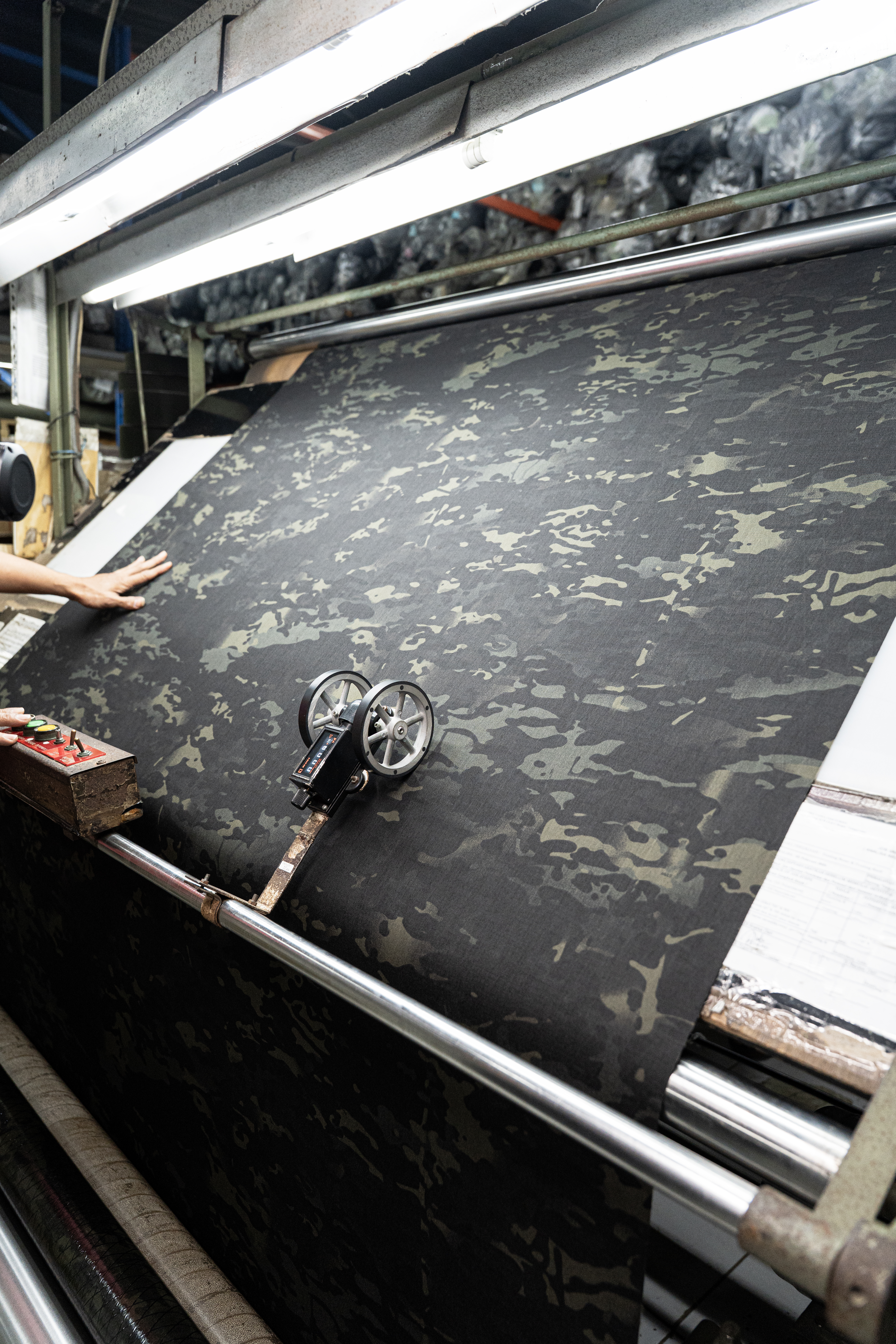 Multicam XPAC fabric on the cutting table, ready for production