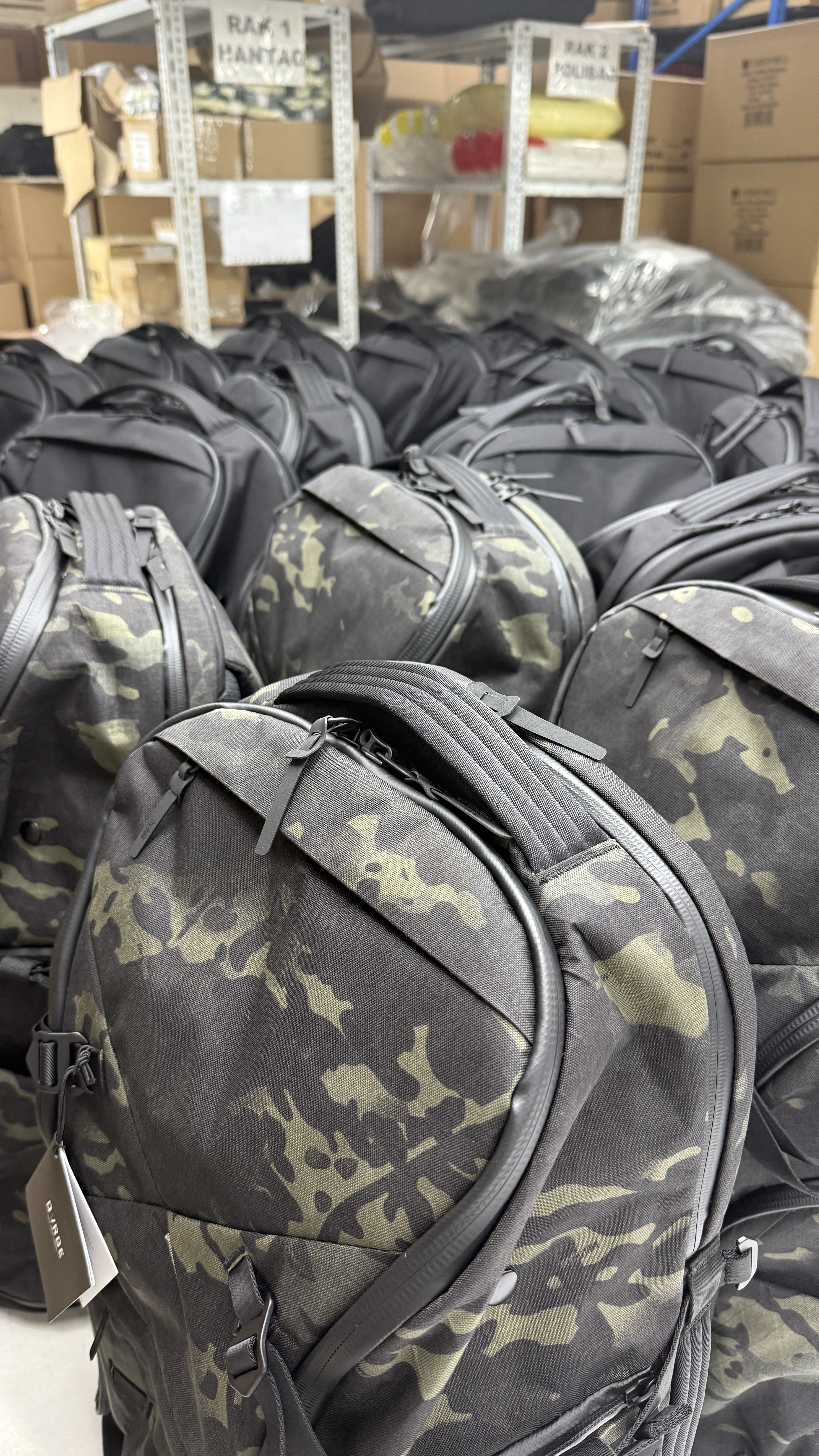 Finished Multicam XPAC backpacks packed in the factory warehouse
