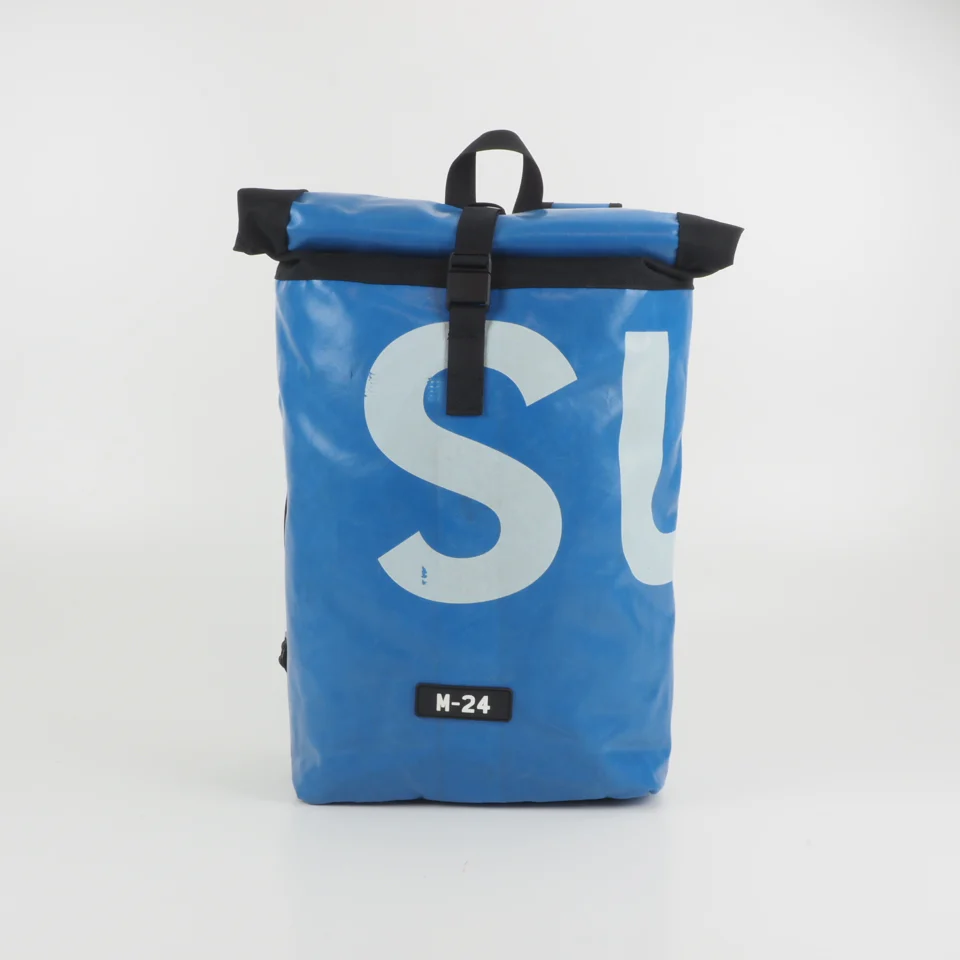 Blue M-24 roll top bag with S and I branding, front view