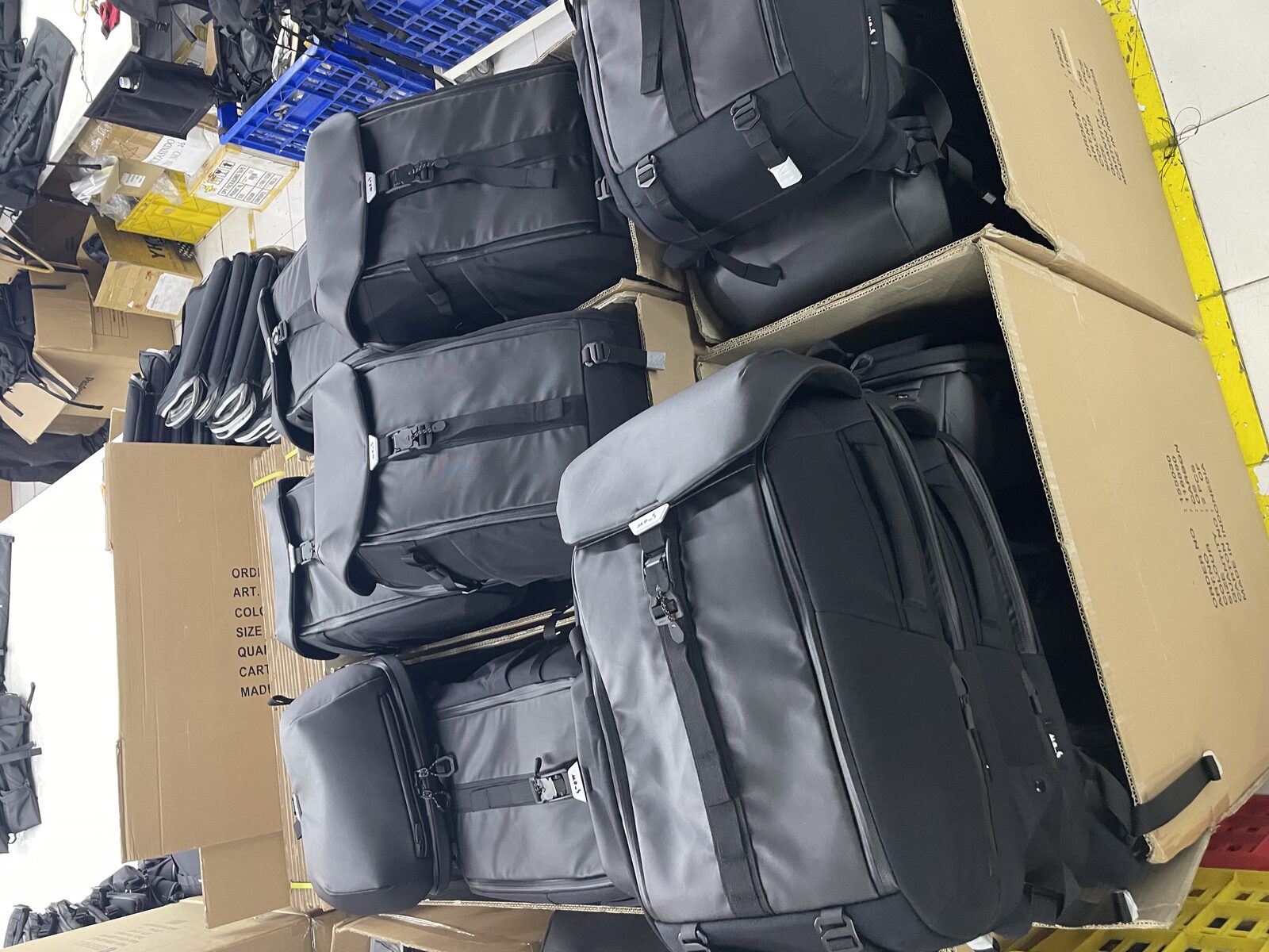 Mous 25L backpacks boxed and ready for shipment