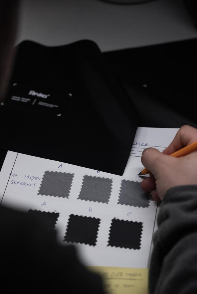 Fabric swatch card with Pantone-matched samples for DI-TEX colour development